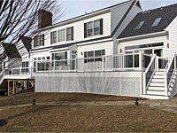 <b>Trex Transcend Island Mist Deck Boards with White Washington Vinyl Railing and Black Round Aluminum Balusters in Glenwood, MD 1</b>